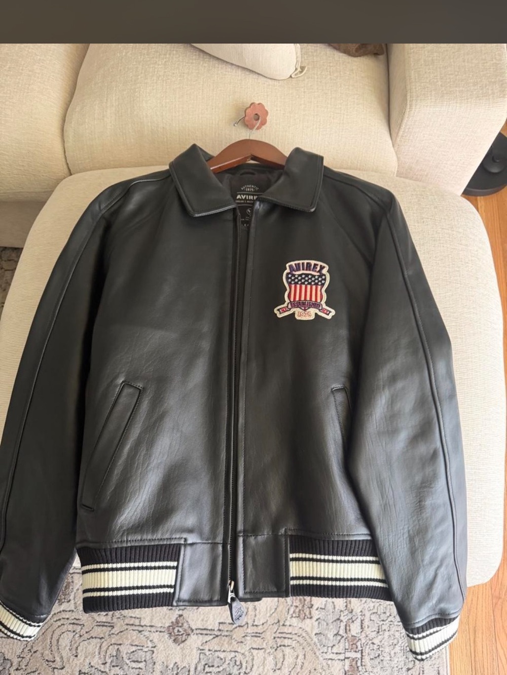 Avirex Black Leather Bomber Jacket with Crest Patch and Striped Ribbing